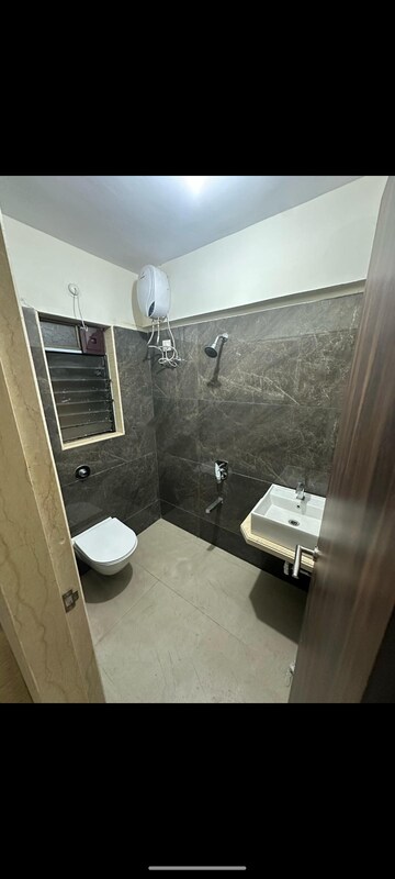 Bathroom in 2 BHK Apartment at Hubtown Hillcrest, Andheri East – for Sale
