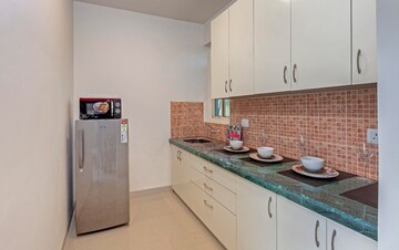 Kitchen in 3 BHK Apartment at Conscient Habitat Residences, Sector 78 – for Sale