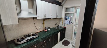 Kitchen in 2 BHK Apartment at Omkar Royal Nest, Tech Zone 4 Greater Noida – for Rent