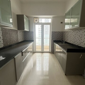 Kitchen in 2 BHK Apartment at Omkar Alta Monte, Laxman Nagar – for Rent