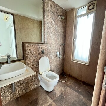 Bathroom in 2 BHK Apartment at Omkar Alta Monte, Laxman Nagar – for Rent