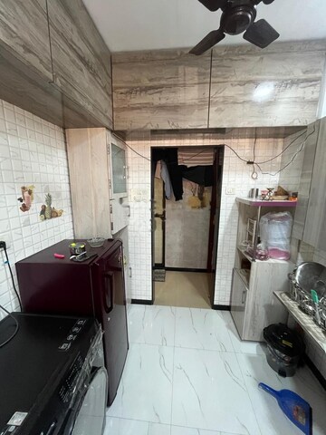 Kitchen in 1 BHK Apartment at RNA NG Royal Park, Kanjurmarg East – for Sale