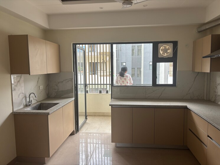 Kitchen, suncity-vatsal-valley 2 Bedroom 1030 Sq.Ft. Apartment In Gwal Pahari Gurgaon 8780516