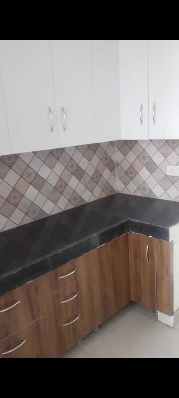 Kitchen in 2 BHK Apartment at Nilaya Greens, Raj Nagar Extension – for Rent