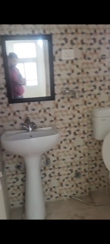 Bathroom in 2 BHK Apartment at Nilaya Greens, Raj Nagar Extension – for Rent