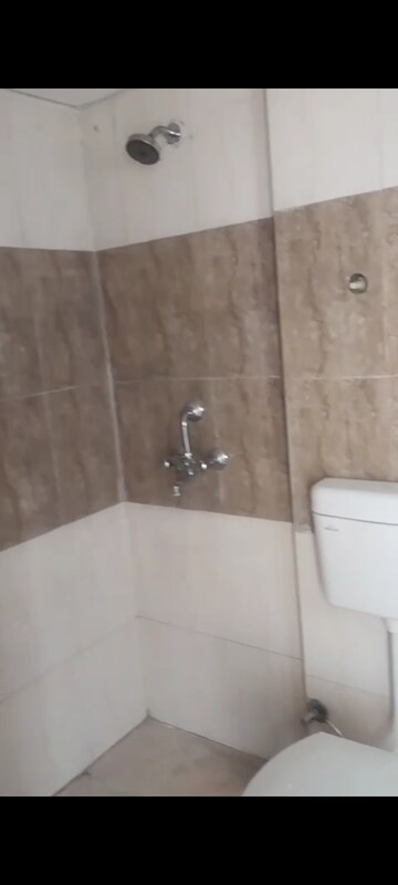 Bathroom in 2 BHK Apartment at Nilaya Greens, Raj Nagar Extension – for Rent