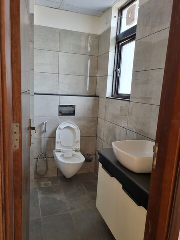 Bathroom in 3 BHK Apartment at Adani Samsara Vilasa, Sector 63 – for Rent