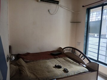 Bedroom in 2 BHK Apartment at Om Shanti CHS Kharghar, Kharghar Sector 10 – for Rent