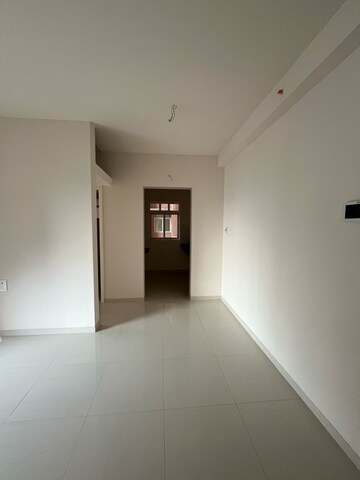 Living Room in 1 BHK Apartment at Godrej Green Cove, Mahalunge – for Rent