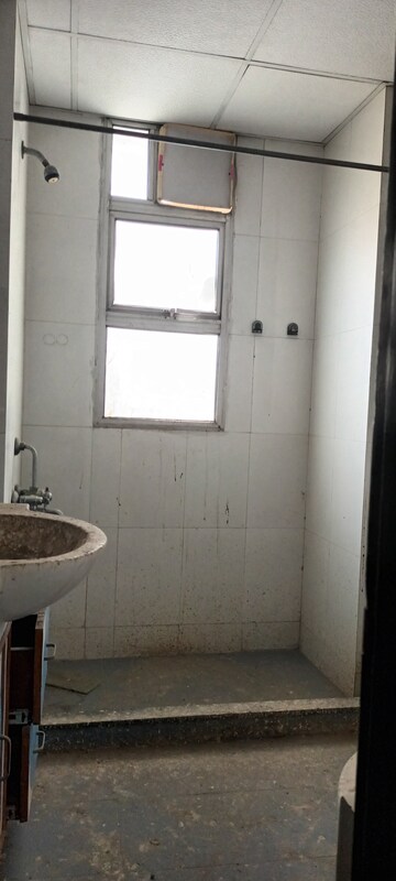 Bathroom in 4 BHK Apartment at Ramprastha Coral Heights, Ramprastha Greens – for Sale
