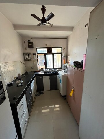 Kitchen in 2 BHK Apartment at Lalani Velentine Apartments II, Goregaon East – for Sale