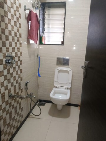 Bathroom in 1 BHK Apartment at Lokhandwala Whispering Palms, Kandivali East – for Rent