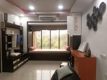 Living Room in 1 BHK Apartment at Lokhandwala Whispering Palms, Kandivali East – for Rent