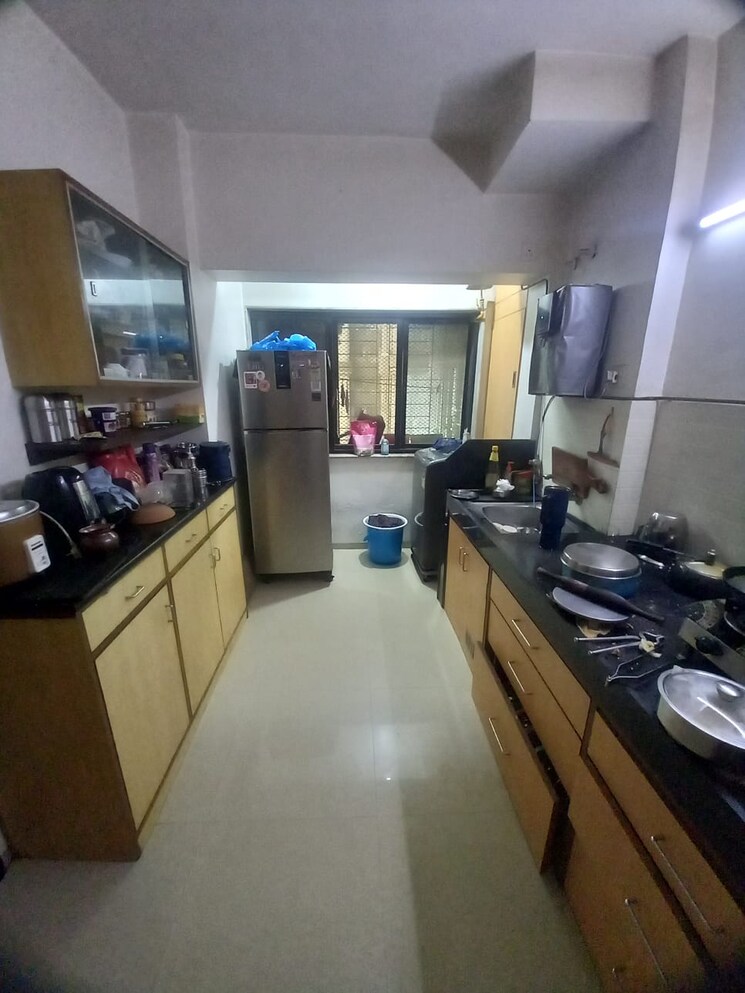 Kitchen, lokhandwala-whispering-palms 2 Bedroom 930 Sq.Ft. Apartment In Kandivali East Mumbai 8781119