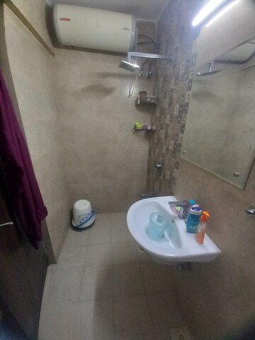 Bathroom in 2 BHK Apartment at Lokhandwala Whispering Palms, Kandivali East – for Rent