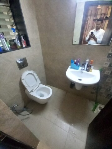 Bathroom in 2 BHK Apartment at Lokhandwala Whispering Palms, Kandivali East – for Rent
