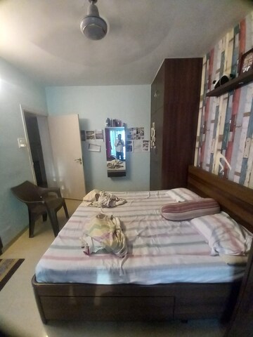 Bedroom in 2 BHK Apartment at Lokhandwala Whispering Palms, Kandivali East – for Rent
