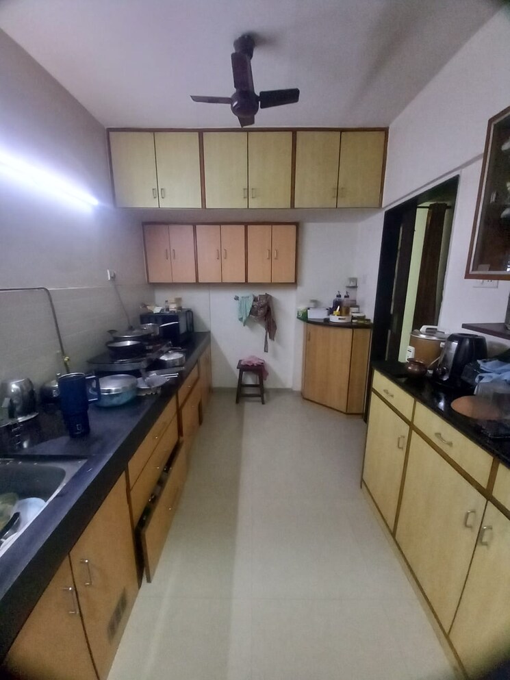 Kitchen, lokhandwala-whispering-palms 2 Bedroom 930 Sq.Ft. Apartment In Kandivali East Mumbai 8781119