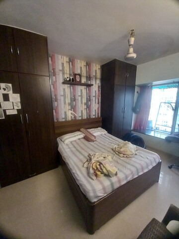 Bedroom in 2 BHK Apartment at Lokhandwala Whispering Palms, Kandivali East – for Rent