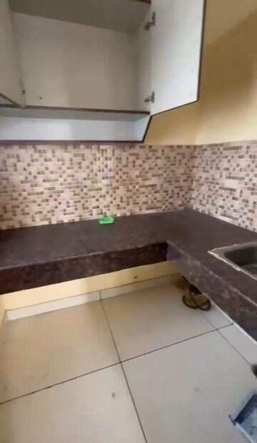 Kitchen in 1 BHK Apartment at DLF City Phase III, Sector 24 – for Rent