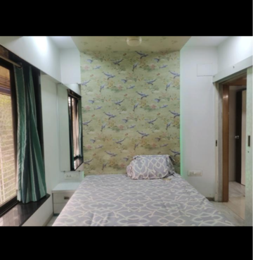 Bedroom in 2 BHK Apartment at Neelkanth CHS Malad West, Evershine Nagar – for Rent