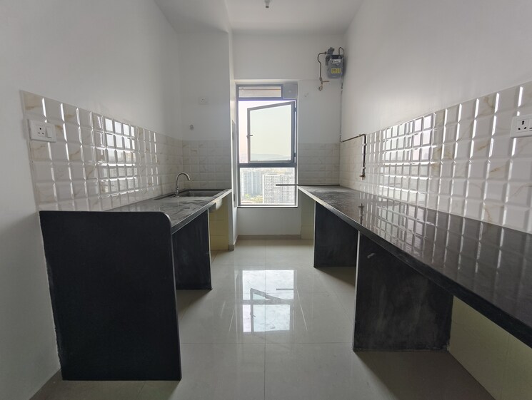 Kitchen, kalpataru-immensa 2 Bedroom 663 Sq.Ft. Apartment In Kolshet Road Thane 8781757