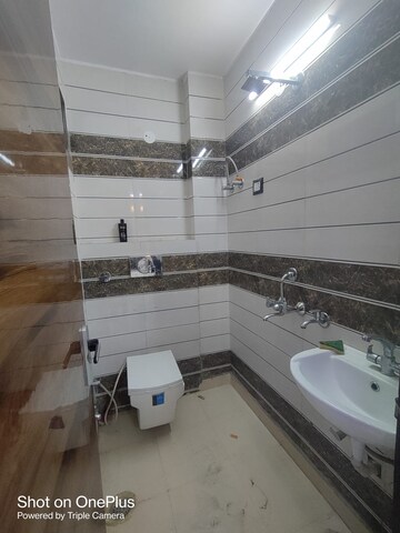 Bathroom in 2 BHK Builder Floor at Dwarka Mor – for Rent