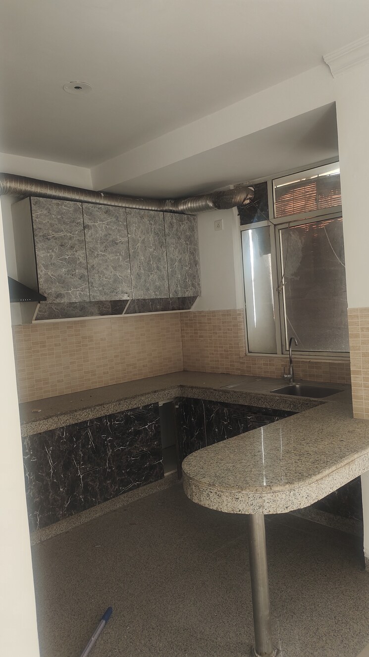Kitchen, signature-global-the-millennia 2 Bedroom 652 Sq.Ft. Apartment In Sector 37d Gurgaon 8782151