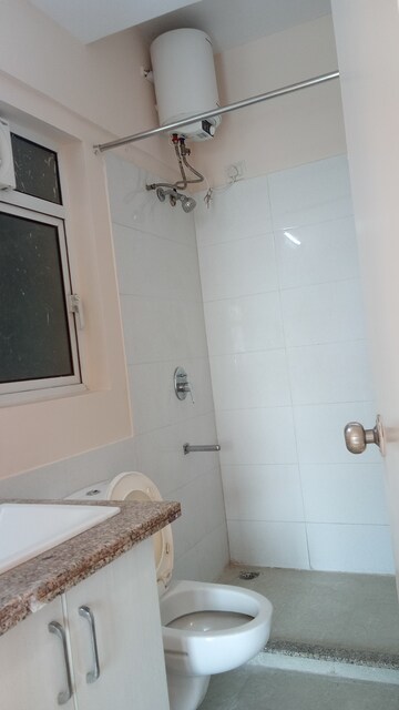 Bathroom in 3 BHK Apartment at Moti Nagar – for Rent