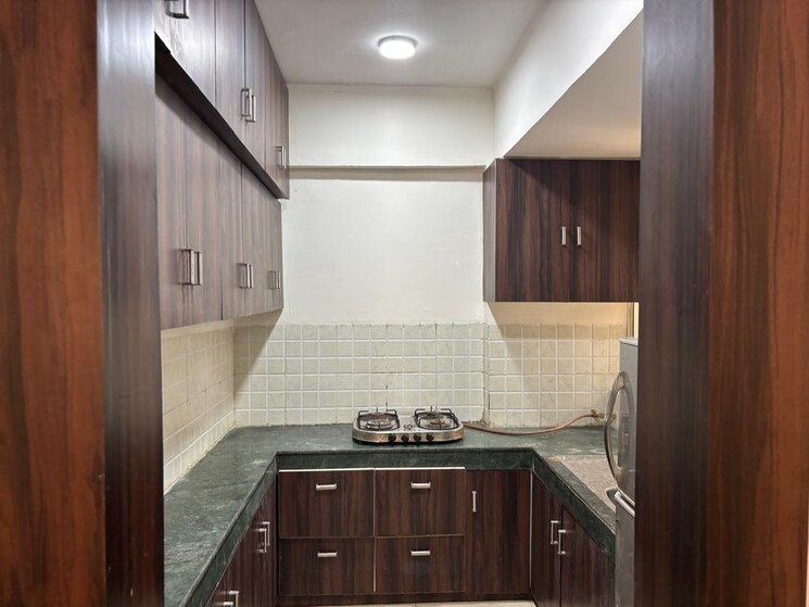 Kitchen, jaypee-greens-kosmos 3 Bedroom 817 Sq.Ft. Apartment In Sector 134 Noida 8782212