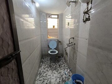 Bathroom in 2 BHK Apartment at Suraj CHS Juhu, Juhu – for Rent