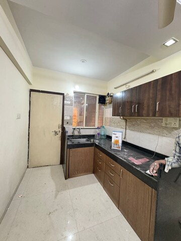 Kitchen in 2 BHK Apartment at GK Peace Valley, Pimple Saudagar – for Rent