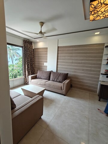 Living Room in 2 BHK Apartment at Karan CHS Versova, Versova – for Rent
