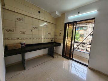 Kitchen in 2.5 BHK Apartment at Mahavir Heights Ghansoli, Ghansoli – for Rent