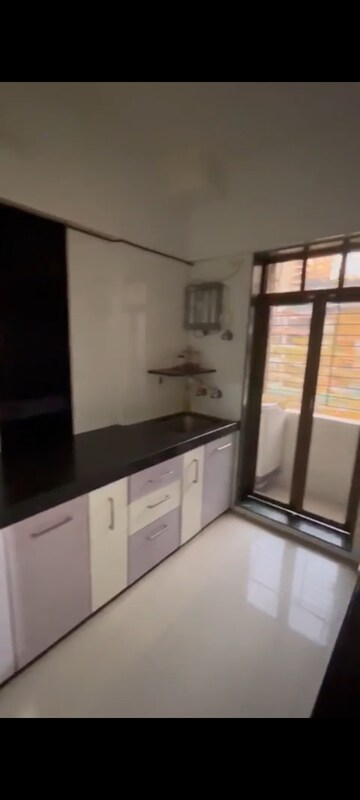 Kitchen in 2 BHK Apartment at Ambika Darshan, Kandivali East – for Rent