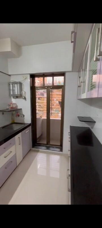 Kitchen in 2 BHK Apartment at Ambika Darshan, Kandivali East – for Rent