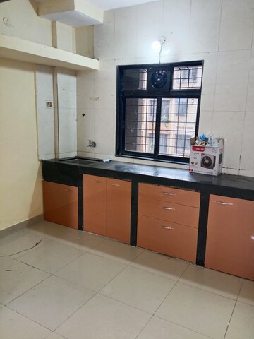 Kitchen in 1 BHK Apartment at Rekhi Sai Tulip, Ghansoli – for Rent