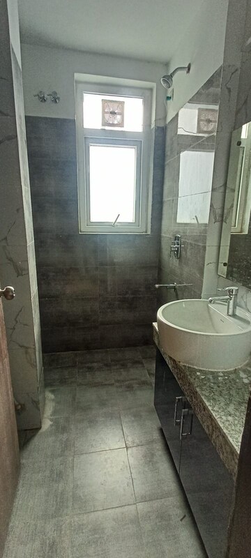 Bathroom in 3 BHK Apartment at Umang Winter Hills, Sector 77 – for Sale
