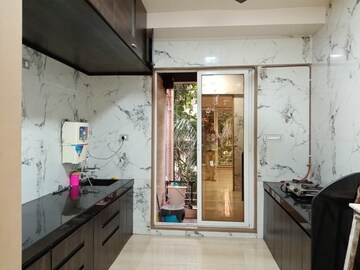 Kitchen in 4 BHK Apartment at Rashmi Signature, Mira Road – for Rent