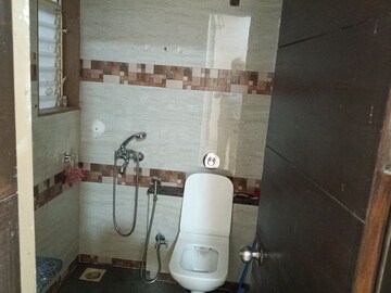 Bathroom in 4 BHK Apartment at Rashmi Signature, Mira Road – for Rent