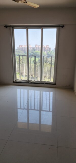 Room in 2 BHK Apartment at Rustomjee Urbania Aurelia, Thane West – for Sale