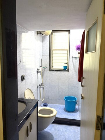 Bathroom in 2 BHK Apartment at Parag Mansion Chs , Andheri West – for Rent