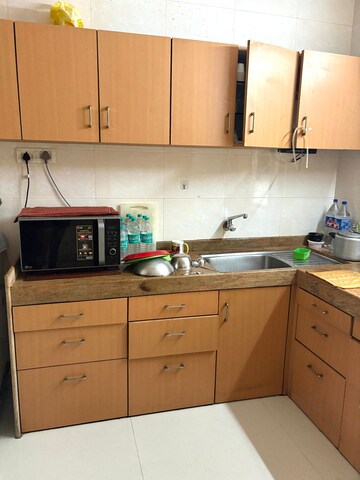 Kitchen in 2 BHK Apartment at Parag Mansion Chs , Andheri West – for Rent