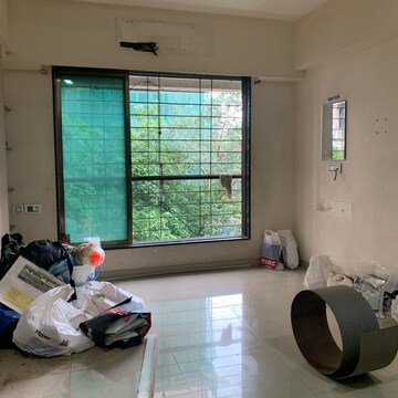 Living Room in 1 BHK Apartment at Mahavir Neelkanth Nagar CHSL, Vivekanand Nagar – for Rent