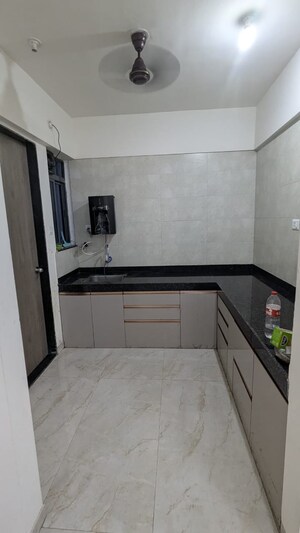 Kitchen in 2 BHK Apartment at Oxy Beaumonde, Viman Nagar – for Sale