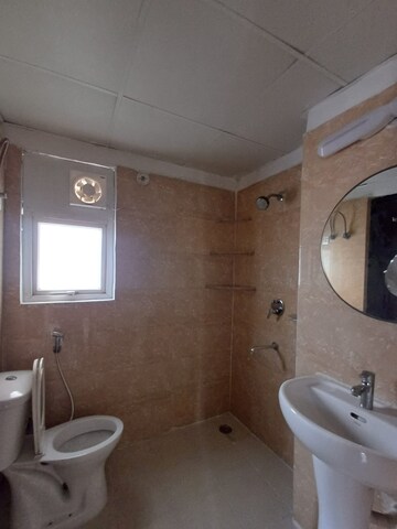 Bathroom in 3 BHK Apartment at Bulland Heights, Sain Vihar – for Sale