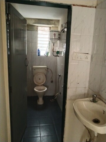 Master Bedroom in 1 BHK Apartment at Nisarg CHS, Gokhalenagar – for Rent