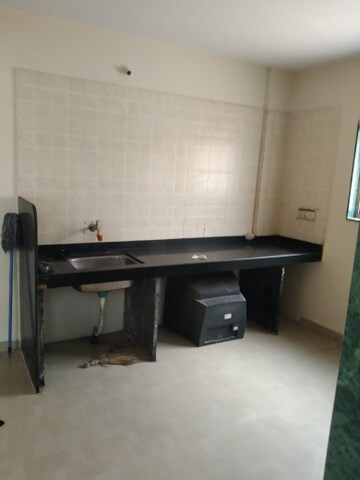 Kitchen in 1 BHK Apartment at Nisarg CHS, Gokhalenagar – for Rent