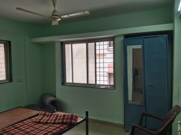 Living Room in 1 BHK Apartment at Nisarg CHS, Gokhalenagar – for Rent