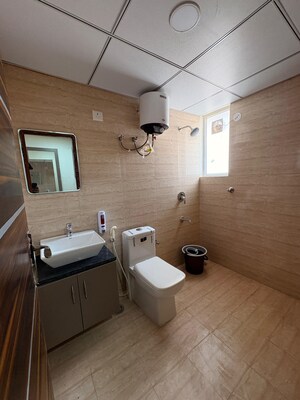 Bathroom in Studio Apartment at Okay Plus Solitaire Suites, Ramnagariya – for Sale